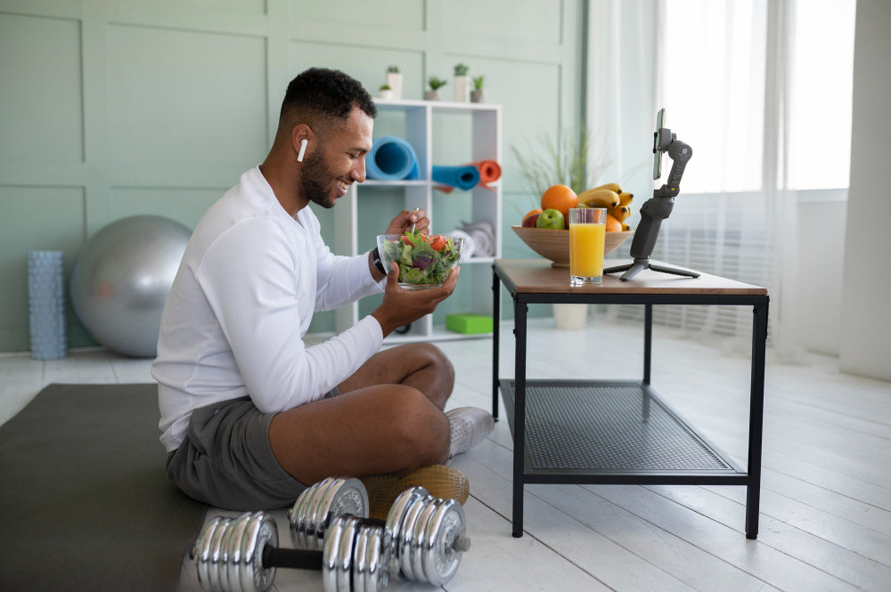 “A professional using Ketolite healthy living tools to maintain a consistent nutrition routine while working at a desk.”